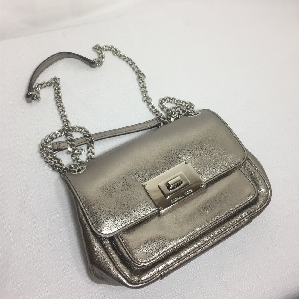 Micheal kors crossbody Metallic Silver purse zippe